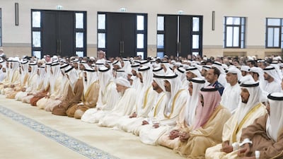 Members of the royal family and other dignitaries attend prayers in Al Bateen. Rashed Al Mansoori / Ministry of Presidential Affairs