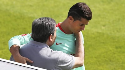 Portugal’s Cristiano Ronaldo (R) greets the President of Portugal Football Federation Fernando Gomes (L) during the training session at the French national rugby team’s camp in Marcoussis near Paris to take part on the Euro 2016, France, 08 July 2016. Portugal faces France on 10 July in the UEFA Euro 2016 Final. EPA/MIGUEL A. LOPES