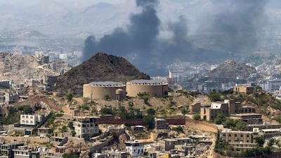Smoke billows from a site that was targeted during battles between Saudi-backed Yemeni government fighters and Yemen's Iran-backed Houthis at the Jabal Han front, west of the city of Taiz, on October 21, 2026. The Saudi-led coalition fighting the Houthis has launched hundreds of raids in Yemen backing the internationally recognised government since the start of the renewed fighting in the long-running civil war. The conflict, dormant for years, erupted again in July and intensified after the Houthis seized the country's Red Sea coast last month. (Photo by AFP) /