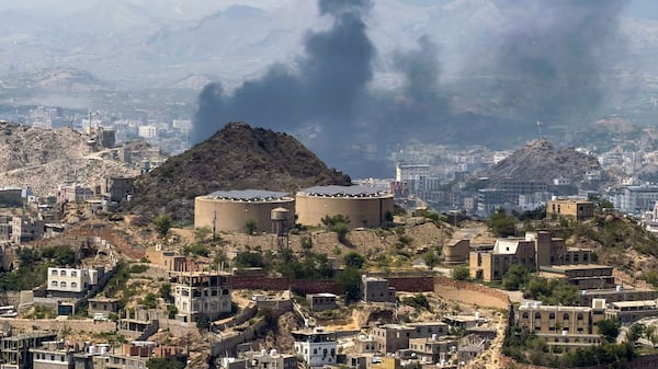 Smoke rises from the site of battles between Yemeni government fighters and the Houthis, west of the city of Taiz. AFP