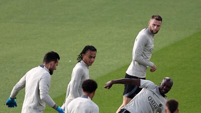 PSG players inclduing Danilo and Milan Skriniar during training. AFP