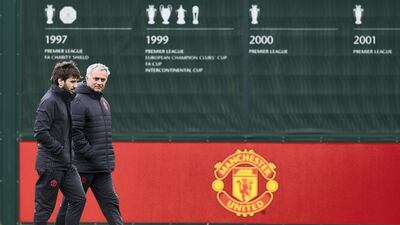 Jose Mourinho arrives to take a training session at Carrington on April 12, 2017. AFP