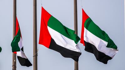 UAE flags at half-mast after the mother of Sheikh Saud bin Rashid Al Mualla, Ruler of Umm Al Quwain, passed away, with three days of mourning declared. Victor Besa / The National