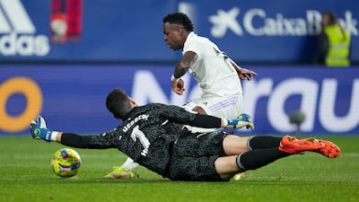 Vinicius Junior of Real Madrid has a shot saved by Sergio Herrera of Osasuna. Getty Images