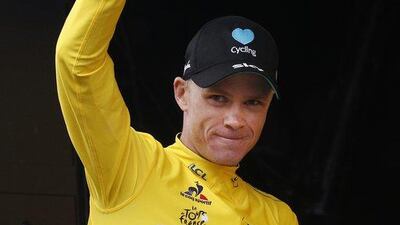 Britain’s Chris Froome, wearing the overall leader’s yellow jersey, celebrates on the podium after the ninth stage of the Tour de France cycling race over 184.5km with start in Vielha Val d’Aran, Spain, and finish in Andorra Arcalis, Andorra, Sunday, July 10, 2016. Christophe Ena / AP Photo