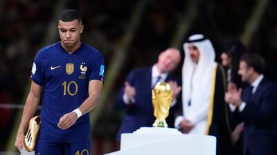 Kylian Mbappe with the Golden Boot award for top goalscorer at the 2022 World Cup in Qatar after France lost in the final against Argentina. AP