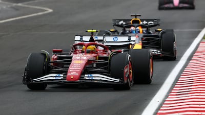 Ferrari's Lewis Hamilton ahead of Max Verstappen's Red Bull. Getty Images