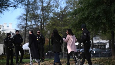 Some guests chose weather-appropriate attire. AFP
