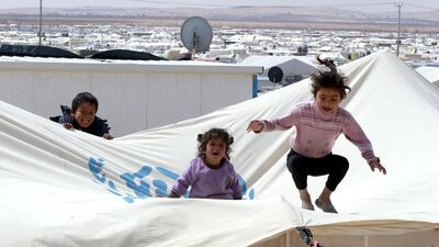 The sprawling Zaatari refugee camp in northern Jordan, near the border with Syria, provides shelter to about 100,000 Syrian refugees. Jordan is home to more than 500,000 such refugees. Khalil Mazraawi / AFP