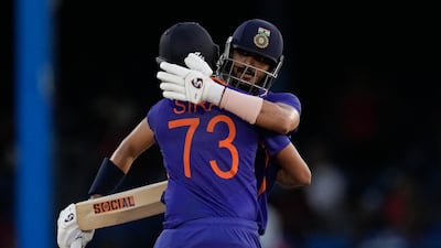 India's Axar Patel celebrates with teammate Mohammed Siraj after hitting a six to win the second ODI cricket match against West Indies at Queen's Park Oval in Port of Spain, Trinidad and Tobago, Sunday, July 24, 2022. (AP Photo / Ricardo Mazalan)
