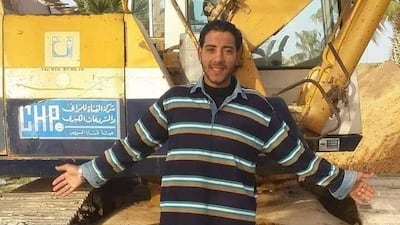 Abdallah Abdelgawad poses in front of his excavator. Courtesy of Abdallah Abdelgawad