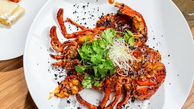 The wok-fried angry lobster is a signature dish and a must-try. Photo: Spago by Wolfgang Puck