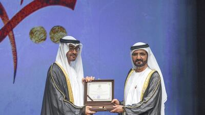 Sheikh Mohammed bin Zayed presents the 2015 ‘Cultural Personality of the Year Award’ to Sheikh Mohammed bin Rashid, Vice President and Prime Minister of the UAE and Ruler of Dubai. Donald Weber / Crown Prince Court - Abu Dhabi