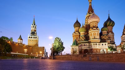 St Basil’s Cathedral stands alongside the Kremlin. Getty
