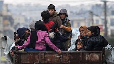 People return to the Ashrafieh neighbourhood after the recent fighting was quelled. Reuters