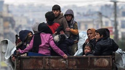 People return to the Ashrafieh neighbourhood after the recent fighting was quelled. Reuters