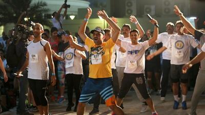 32 corporate teams took part in the inaugural short-distance relay race, which attracted 320 male and female runners of varying levels of fitness and abilities. Pawan Singh / The National
