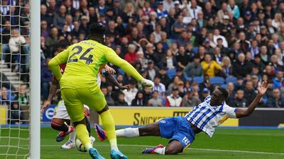 Brighton's Danny Welbeck scores their opener. PA