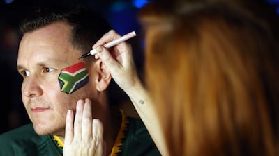 Fans make their final preparations for the match. Chris Whiteoak / The National