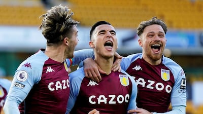 Aston Villa's Anwar El Ghazi, centre, celebrates scoring their winner from the penalty spot. Reuters
