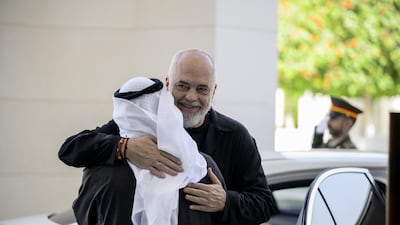 Sheikh Mohamed receives Mr Rama before sitting down for a meeting