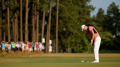 Martin Kaymer of Germany putts on the 14th hole during the third round of the 114th US Open on Saturday. Mike Ehrmann / Getty Images / AFP / June 14, 2014