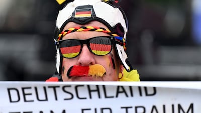 The German fan wears his colours. AFP