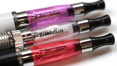 The $3 billion e-cigarette industry markets its products as a less toxic product that can help smokers quit. Dan Kitwood / Getty Images