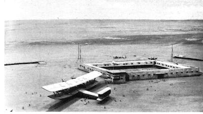 An extension was added to the rest house in 1939 as a result of increased personnel during the Second World War. This image shows the landing of a Hannibal class plane in 1933. The runway was converted into a road, now known as King Abdul Aziz Street, in the 1960s, while the airstrip remained in use until the Sharjah International Airport opened in 1977. Photo: Flight Magazine