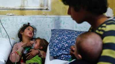 Victims of a reported gas attack on the rebel-held besieged town of Douma in the eastern Ghouta region on the outskirts of the capital Damascus on January 22. AFP/HASAN MOHAMED