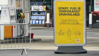 A 'no fuel' sign on the forecourt of a Shell petrol station in Reading, Berkshire. While the fuel shortage boosted sales for some petrol stations, others without supplies lost out. PA