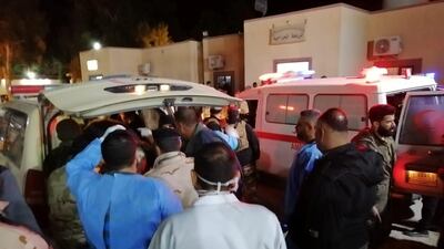 An ambulance transports wounded members to hospital. Reuters