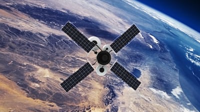 Satellite orbiting Earth. Getty Images