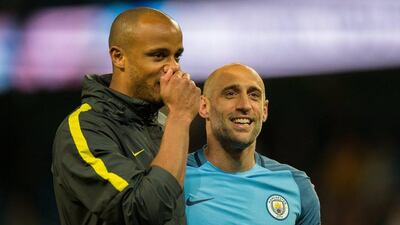 Manchester City's Pablo Zabaleta walks with Vincent Kompany during lap of honour after defeating West Bromwich Albion held at the Etihad Stadium on May 16, 2017. Peter Powell / EPA