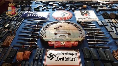 The large arsenal seized in Turin at the house of a neo-Nazi. Reuters