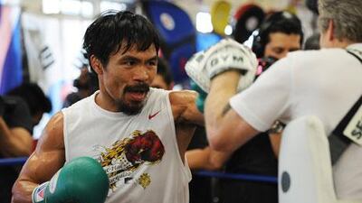 Manny Pacquiao has been involved in the national political scene in the Philippines. Robyn Beck / AFP