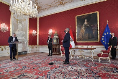 The ceremony took place at the presidential palace in Vienna, days after Sebastian Kurz's surprise retirement from politics. AFP
