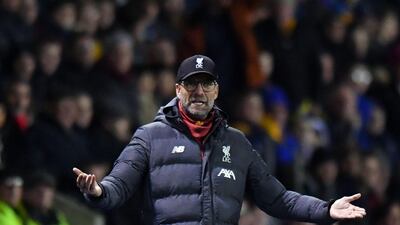 Jurgen Klopp will hand over the managerial reins to under-23 coach Neil Critchley for Liverpool's FA Cup replay with Shrewsbury Town. AFP