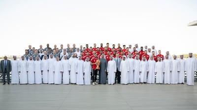A full squad photo with President Sheikh Mohamed