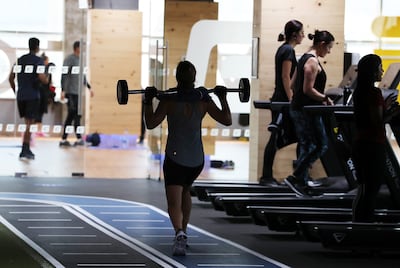 GymNation, which has branches across the UAE, reports steady attendance. Pawan Singh / The National