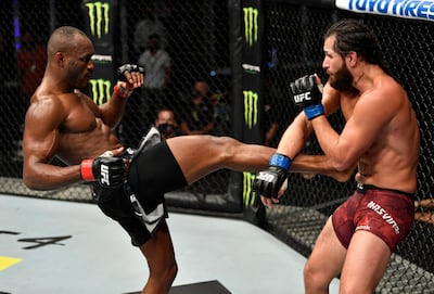 Kamaru Usman kicks Jorge Masvidal in their UFC welterweight championship fight on Yas Island. Getty