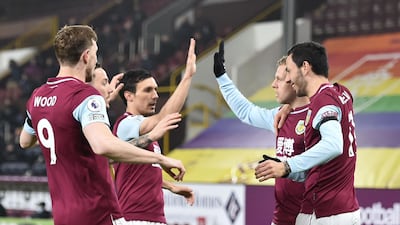Burnley's Czech striker Matej Vydra (2R) celebrates with team-mates after scoring the opening goal during. AFP