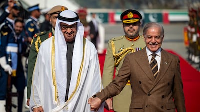 President Sheikh Mohamed is received by Shehbaz Sharif on arrival at Nur Khan Air Base. Omar Al Askar / UAE Presidential Court
