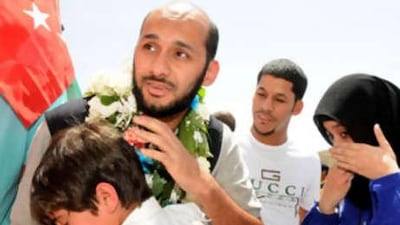 Mubarak al Mutawa, one of the 16 Kuwaiti activists on an aid convoy sailing to Gaza, reunites with loved ones in Kuwait.
