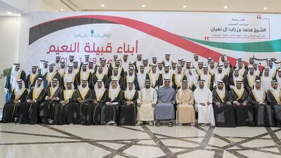 Sheikh Mohammed bin Zayed with the grooms. With them are Sheikh Tahnoon bin Mohammed Al Nahyan, front row 10th right, Sheikh Abdulaziz bin Humaid bin Rashid Al Nuaimi, front row eight right, and Bakhit bin Suaidan Al Nuaimi, front row seventh right. Mohamed Al Hammadi / Crown Prince Court - Abu Dhabi
