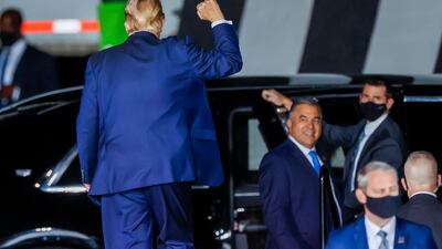 US President Donald J. Trump gestures to supporters after speaking at his Make America Great Again Rally campaign event at Middle Georgia Regional Airport. EPA