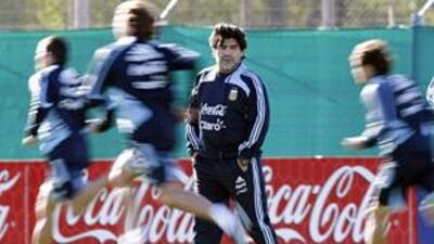 Diego Maradona watches his Argentina squad train on Tuesday in Buenos Aires.
