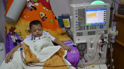 Nine-year-old Yahiya Eawaini dozes off as he receives kidney dialysis treatment in Gaza City's Al Rantissi children’s hospital. Naomi Zeveloff for The National