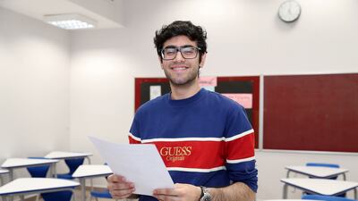 Bhumit Singh smiles after receiving his results.