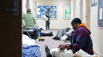 Aaron Williams prepares to eat a meal after taking shelter at a Salvation Army centre in Plano, Texas. Reuters